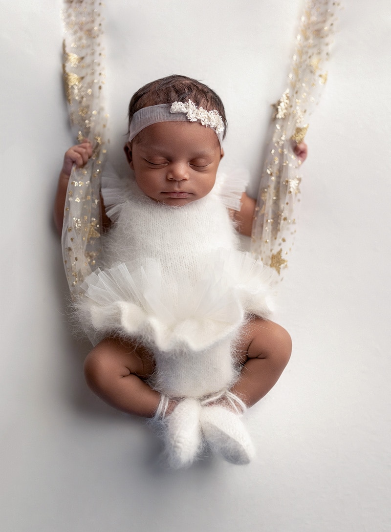 Ballerina outfit on a newborn baby captured Austin newborn photographer.