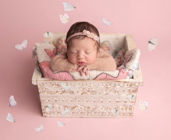baby inside a bucket, baby with butterflies photo, baby with an antique blanket photo