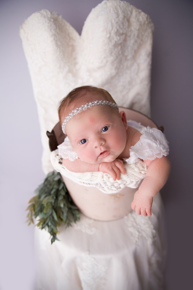 Baby in a bucket, baby with mothers wedding dress, Austin baby with white wedding dress