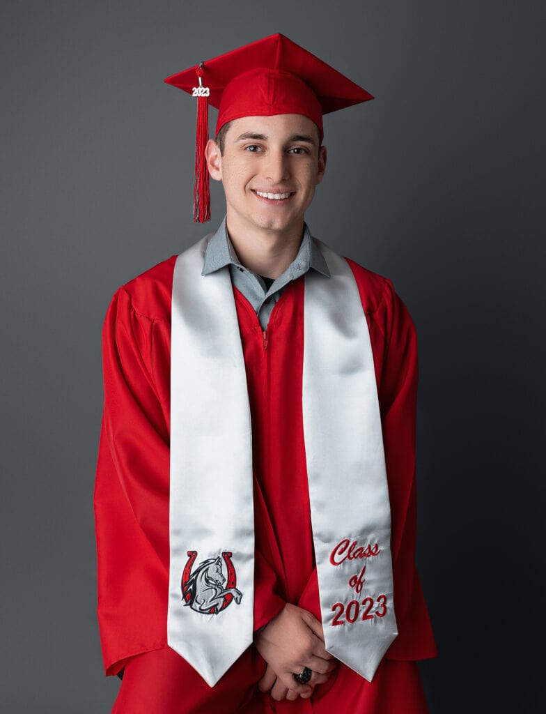Austin, Texas senior photoshoot with graduation cap and gown.