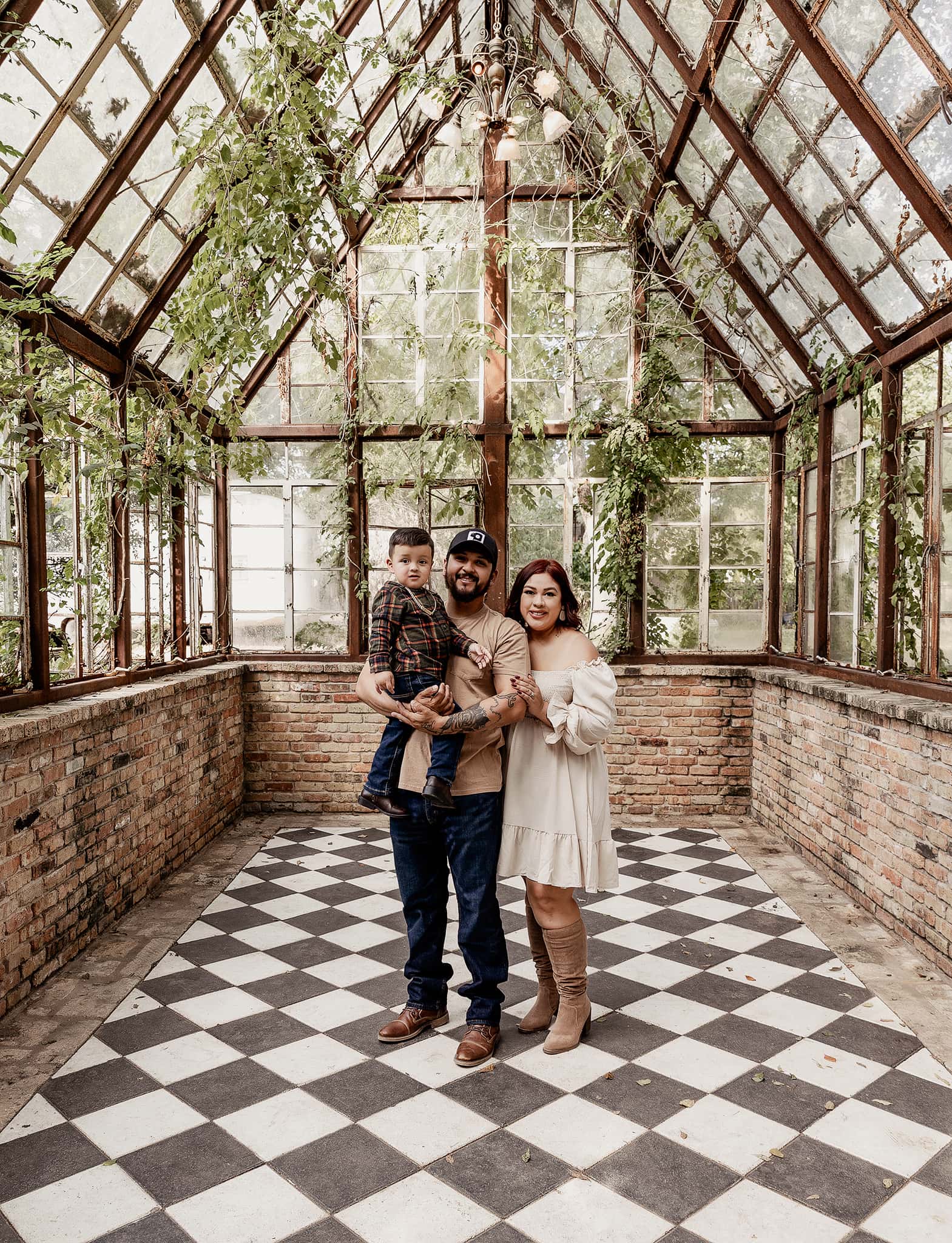 Family portrait at a beautiful greenhouse in Austin, Texas.